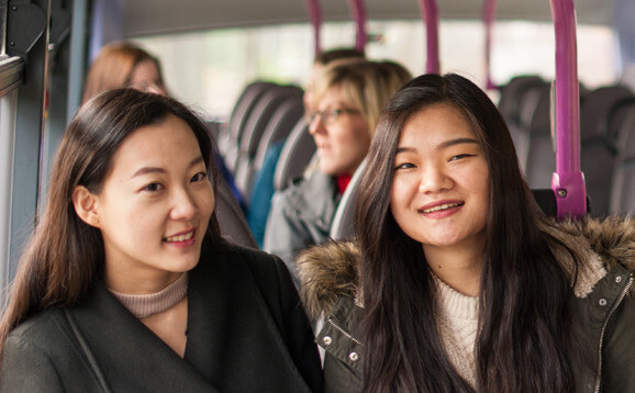 International students on a bus