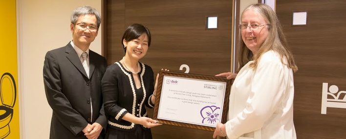 Tokyu Land Corporation is presented with a gold accreditation for dementia design by the University of Stirling's Professor Alison Bowes.