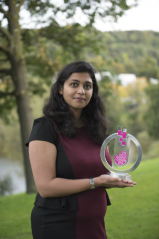 Anita George with her Data Lab trophy for her data analysis project with NHS National Services Scotland