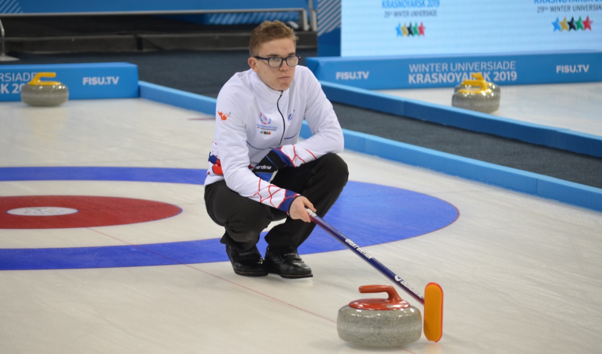 Ross Whyte at curling training at World University Winter Games
