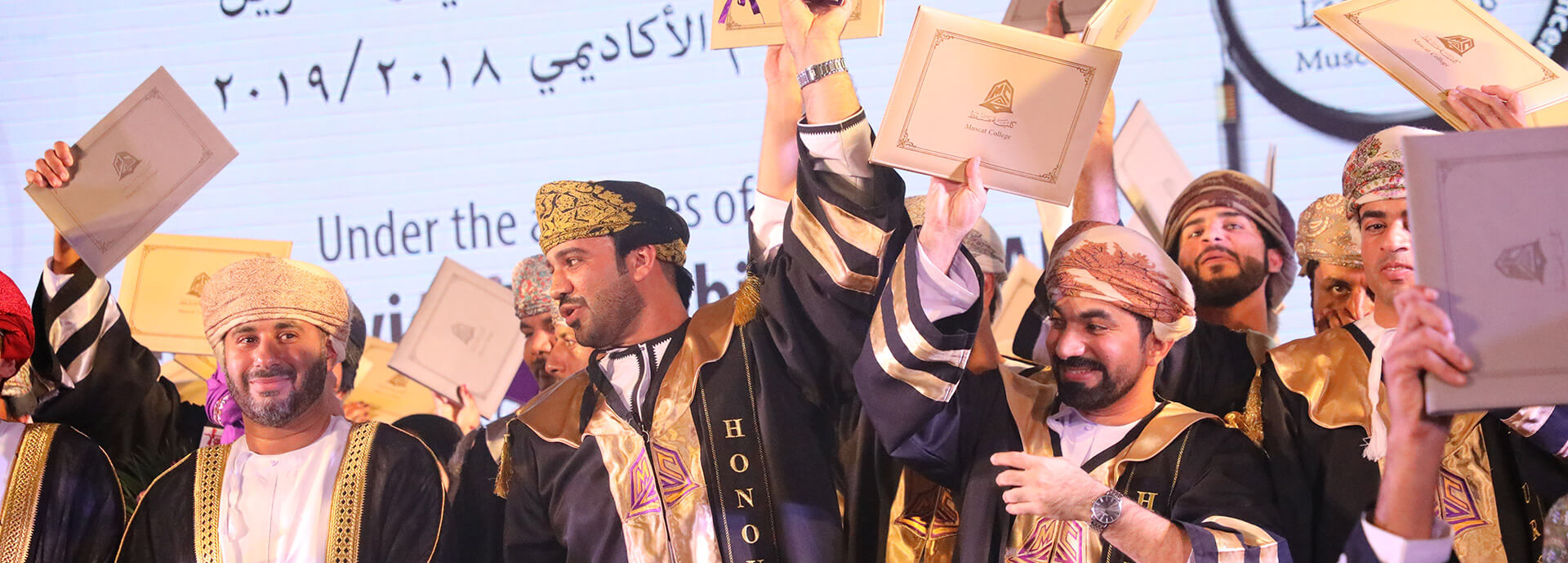 Students from Muscat celebrating graduation