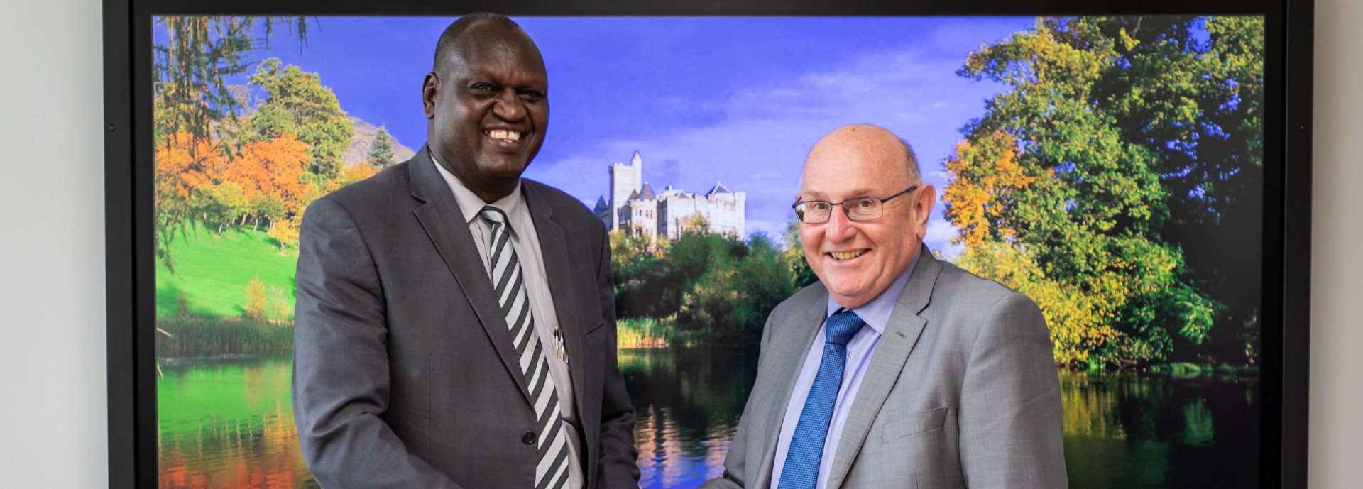 Professor Isaac Sanga Kosgey, Vice Chancellor of Moi University, and Professor Leigh Sparks, Deputy Principal of University of Stirling