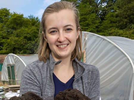 PhD researcher GeorginaPage at University of Stirling with peat samples