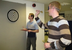 Dr Pete Coffee analyses a subject's throw during the study.