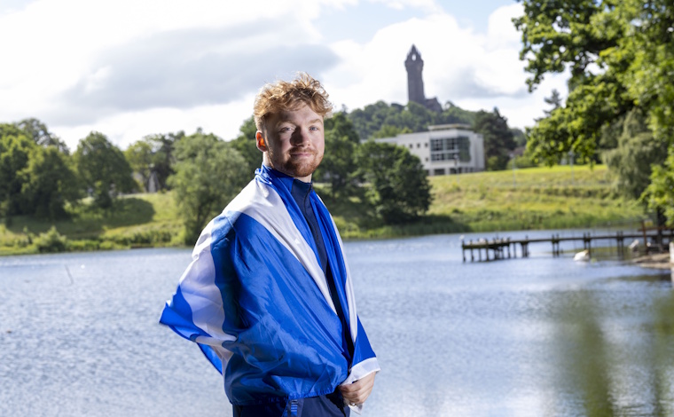 Cameron Lynn with Scottish flag