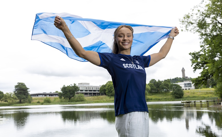 Lucy Grieve with Scottish flag.