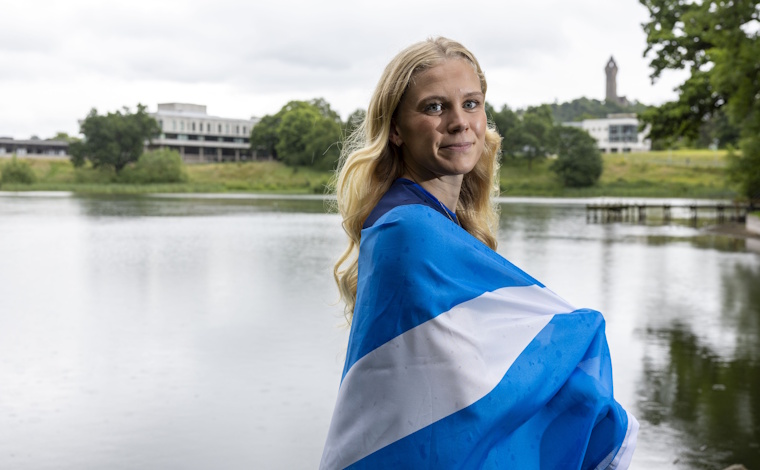 Lucy Hope with Scottish flag.