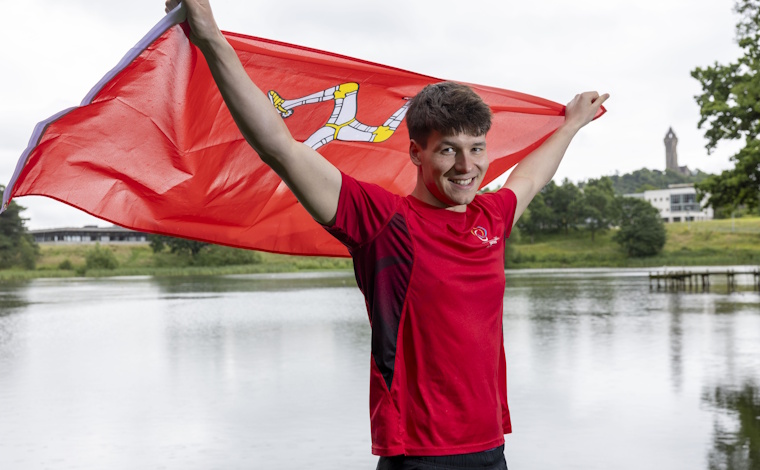 Peter Allen with the flag of Isle of Man.