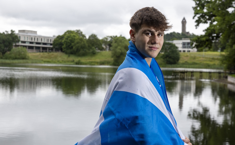 Sam Downie with Scottish flag.