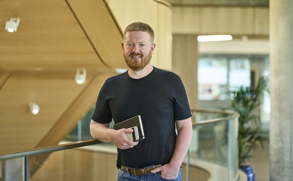 Student standing in Campus Central