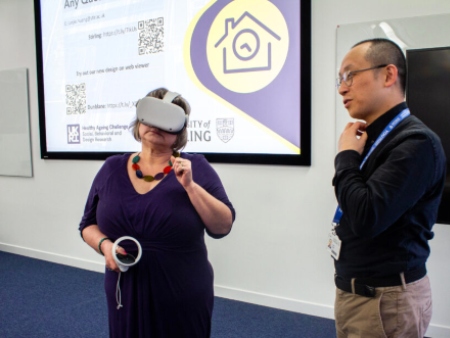 woman with VR headset on and man