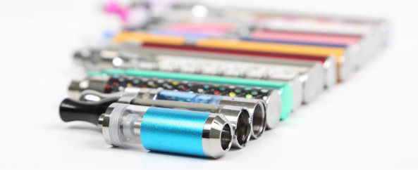 e cigarette devices in a row from smallest to largest varying in colour