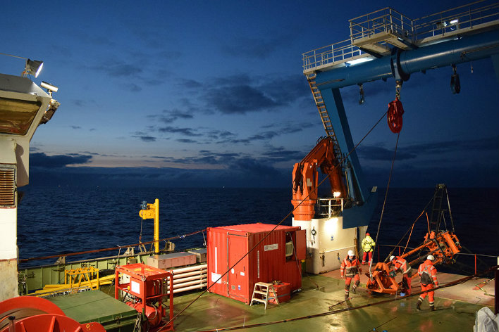 research team in taking samples offshore