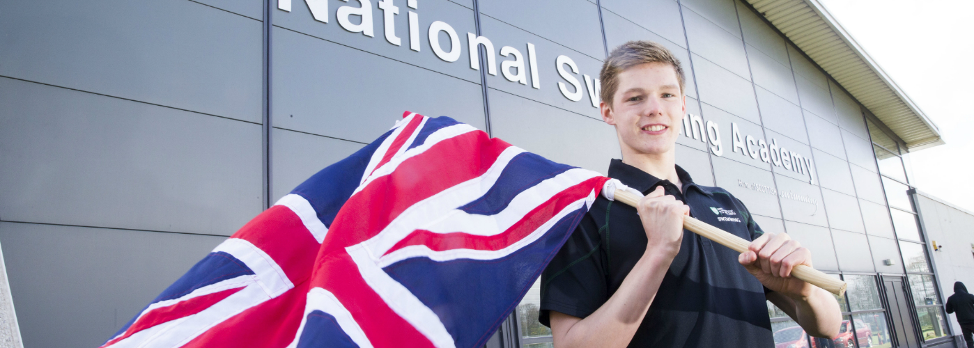 Duncan Scott holding a flag