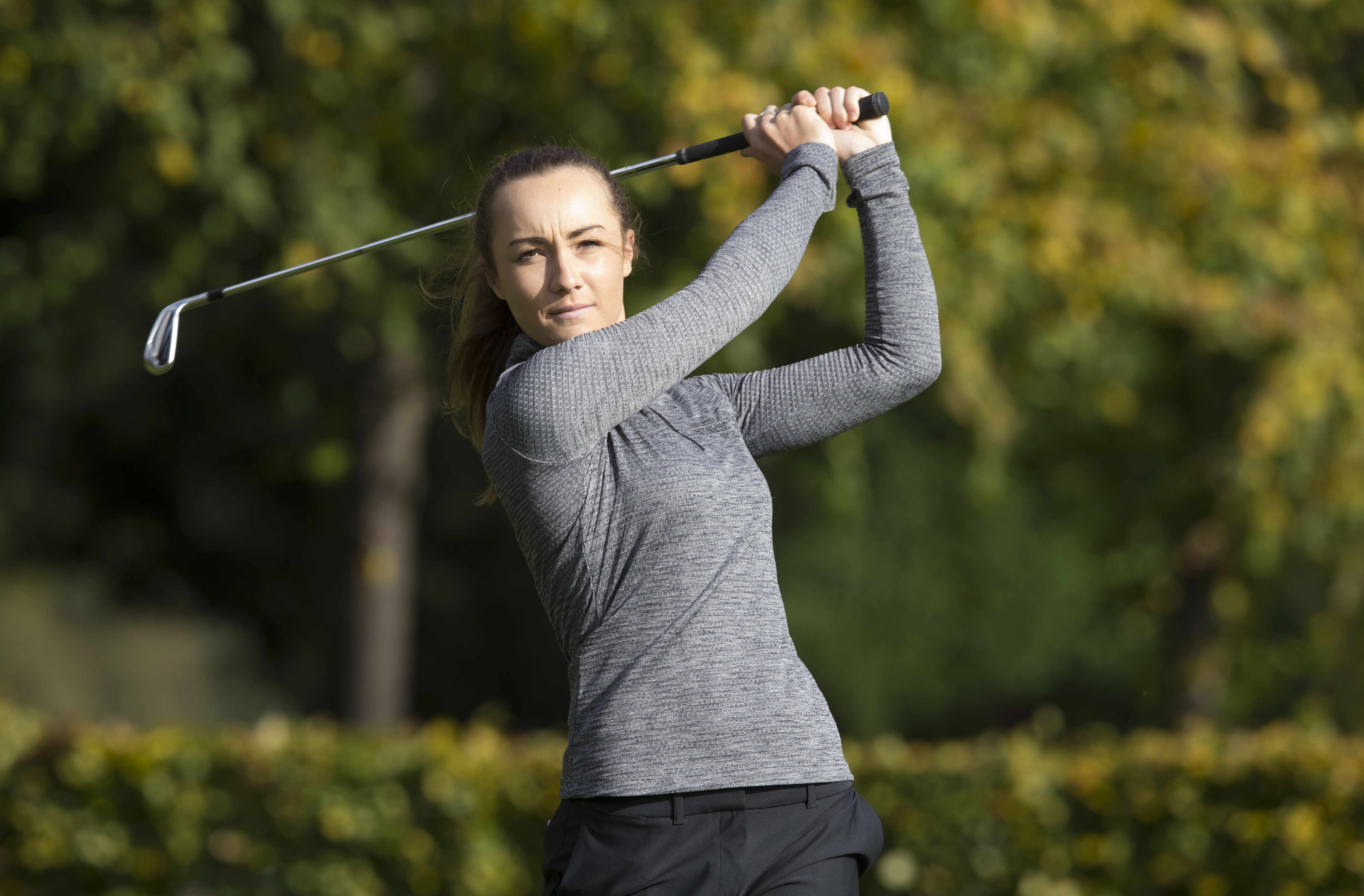 Hazel MacGarvie playing golf