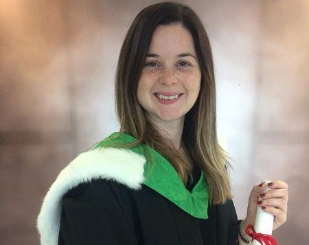Claire Philip in graduation robe