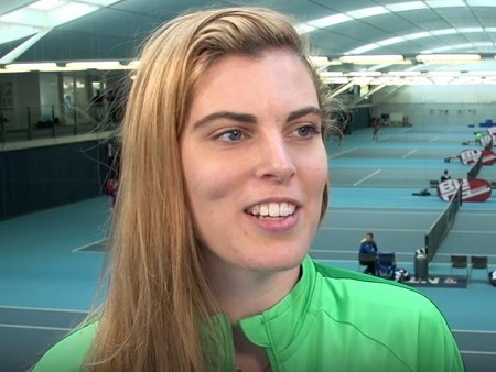 head shot of female tennis player on indoor court