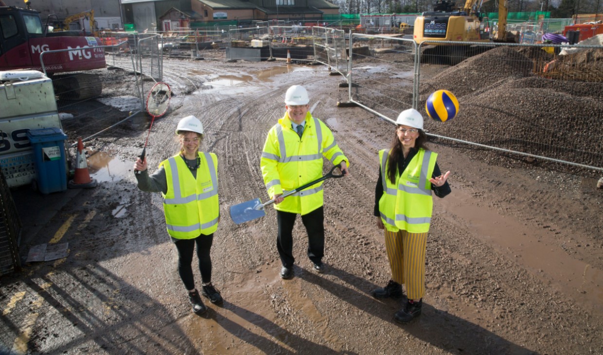 Astrid Smallenbroek, Professor Gerry McCormac and Caitlin Ormiston on construction site of new sports centre