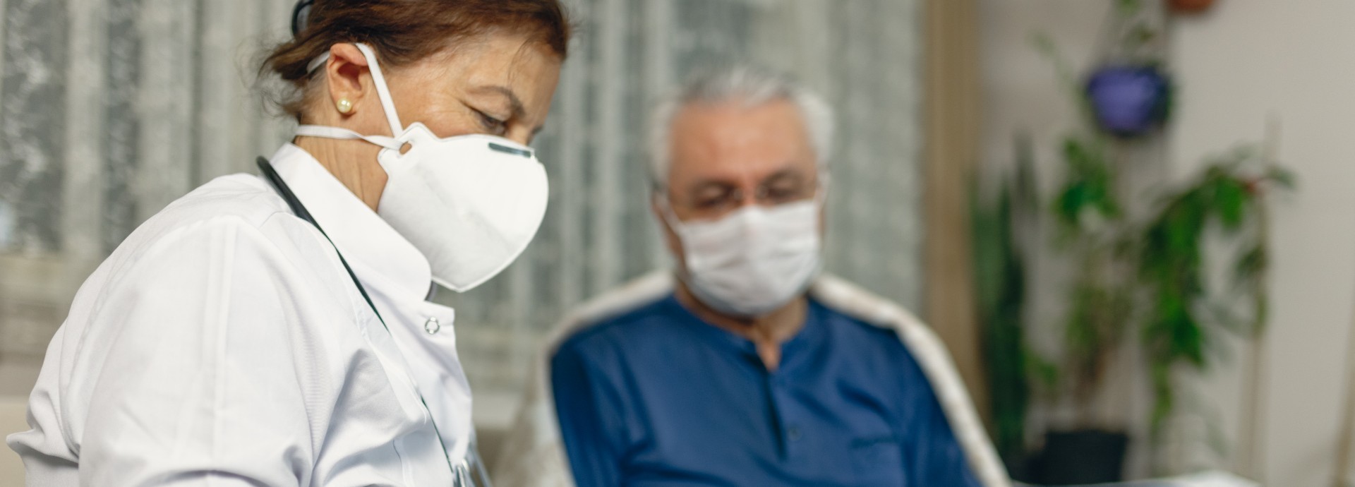 Doctor and patient in masks