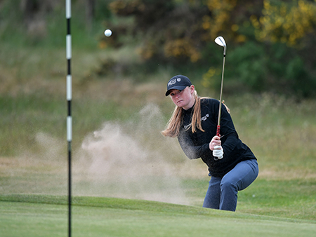 Louise Duncan hitting golf shot