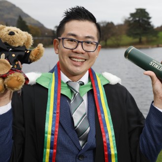 University of Stirling winter graduates celebrating - p1s