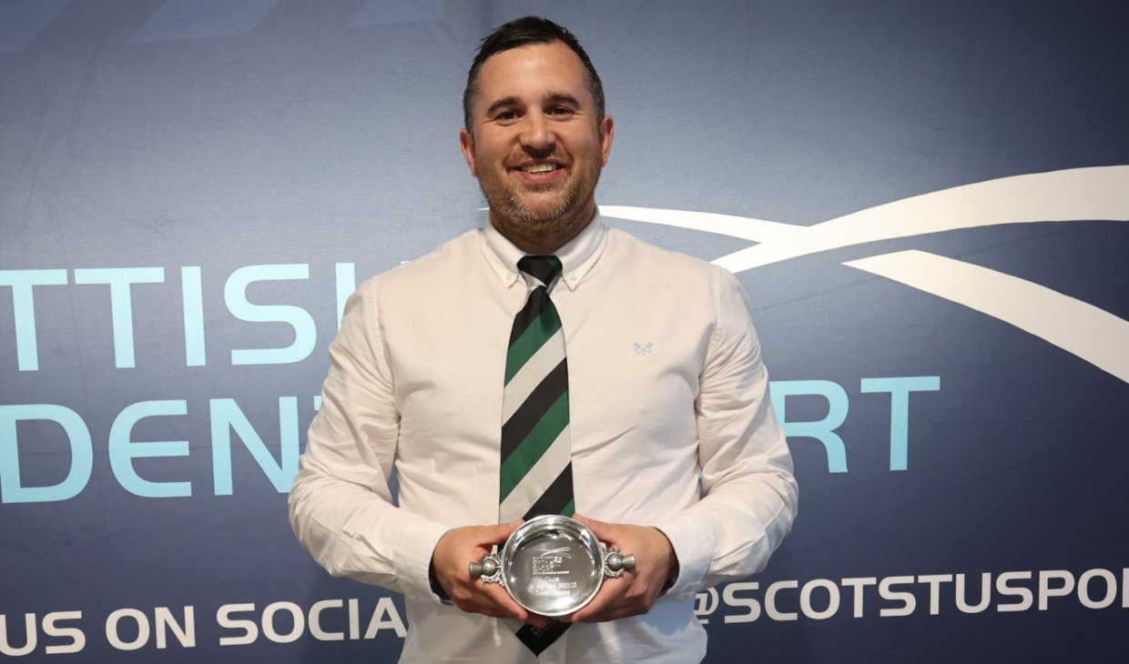 Chris Geddes is presented with Coach of the Year Award at the Scottish Student Sport Awards.