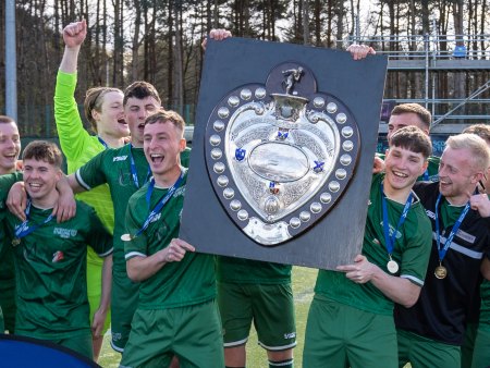 University of Stirling footballers lift the Queen's Park Shield.