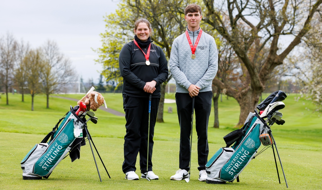 Lorna McClymont and George Cannon pictured with University of Stirling golf bags.