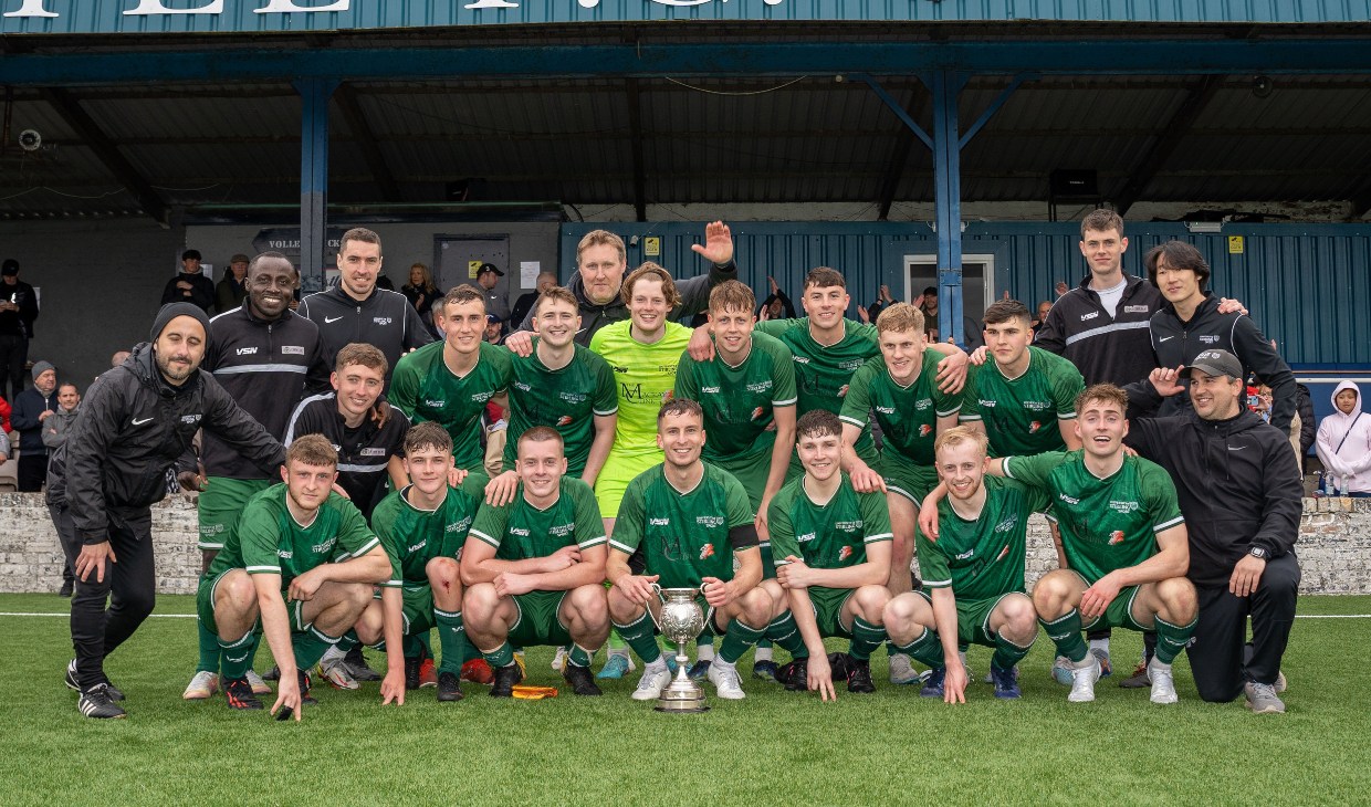 University of Stirling football team celebrate after cup win.