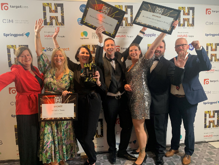 Communications, Marketing, Digital team celebrate at the Heist Awards.