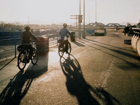 two cyclists in city