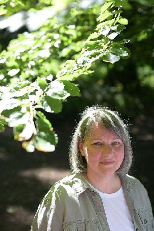 Charlene Scott under tree