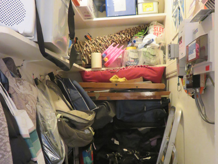 Cluttered cupboard
