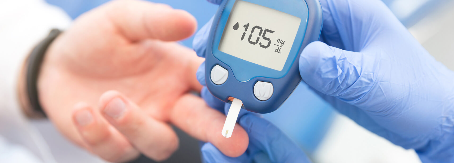 Diabetes test being done on a finger