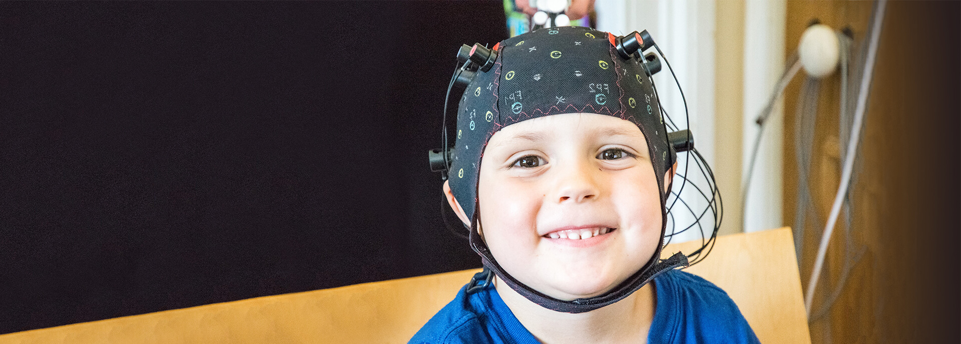 Child undergoing neurocognitive development research