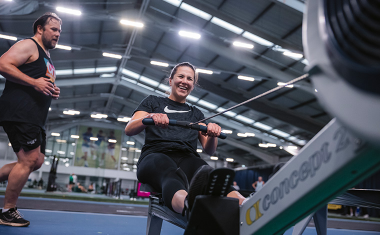 Women on rowing machine