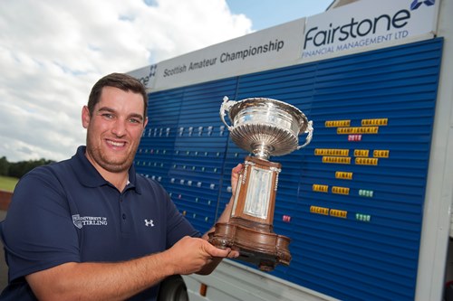 Zander Culverwell holding the Scottish Championship Trophy