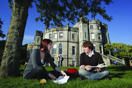 Students outside Airthrey Castle on campus