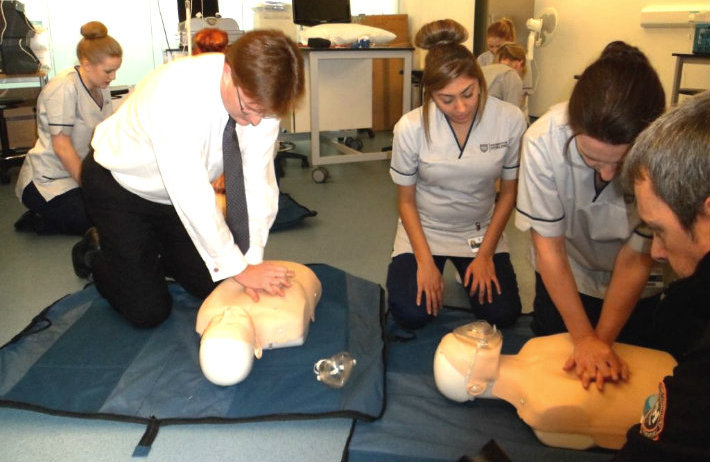 Danny Alexander MP tries some CPR during his visit to the University's Highland Campus in Inverness.