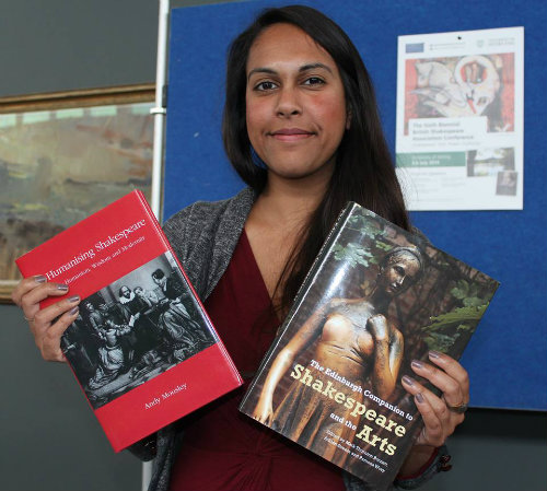 Picture of woman holding books on Shakespeare