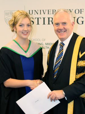 Olivia Hall with Professor Gerry McCormac, Principal and Vice-Chancellor