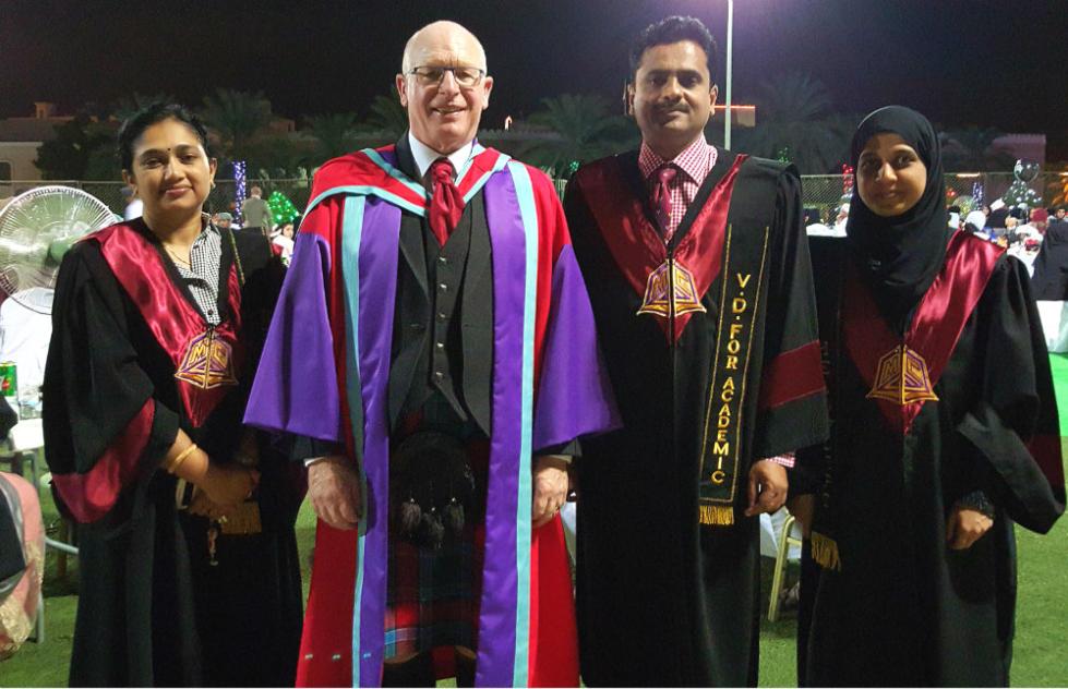 Professor John Gardner joins graduates and colleagues at Muscat College